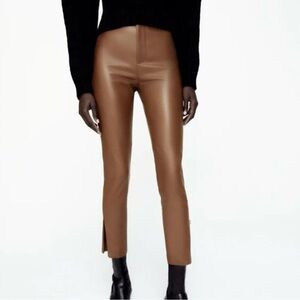 NWT Faux Leather High Waist Leggings With Side Zip At The Hems, Size XS.